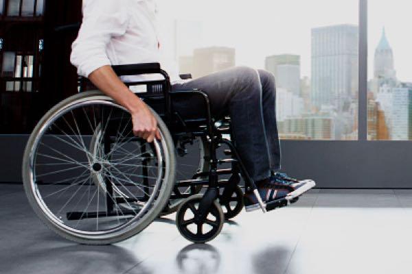 Shoulders down view of a man in a wheelchair
